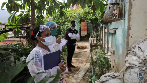 Doctors take a walking round at the low-income neighbourhood of Las Mayas, as cases rise amid the coronavirus disease (COVID-19) outbreak, in Caracas, Venezuela July 14, 2020 - Sputnik International