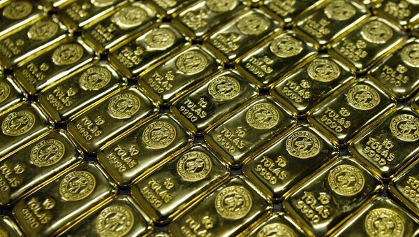 Gold bars are displayed at South Africa's Rand Refinery in Germiston in May 30, 2006.  - Sputnik International