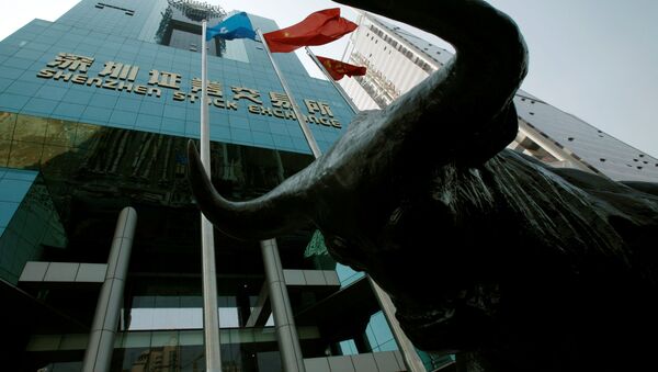 A statue of a bull is displayed outside the Shenzhen Stock Exchange in the southern Chinese city of Shenzhen October 23, 2009. - Sputnik International
