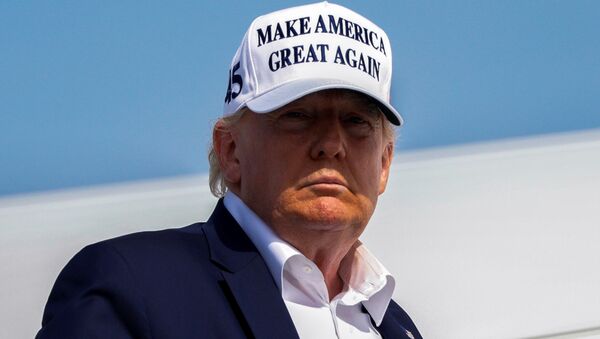 U.S. President Donald Trump boards Air Force One as he travels to Joint Base Andrews in Maryland, at Morristown Municipal Airport, in Morristown, U.S., July 26, 2020 - Sputnik International
