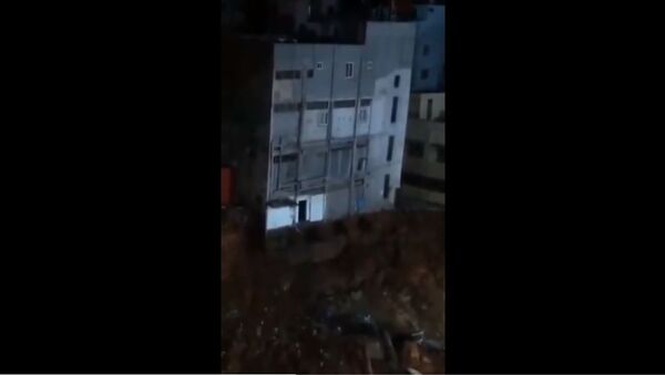 A four storeyed building behind Kapali Theatre in Bangalore collapses  - Sputnik International