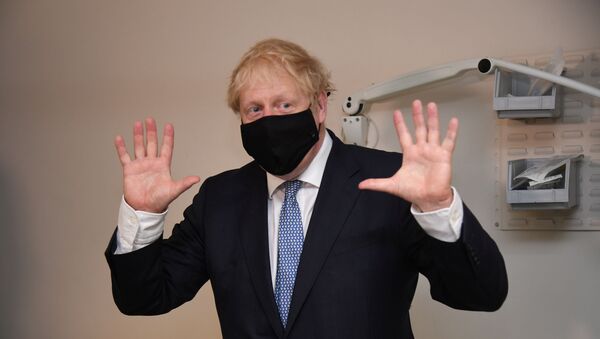 Britain's Prime Minister Boris Johnson visits the Tollgate Medical Centre in Beckton, London - Sputnik International