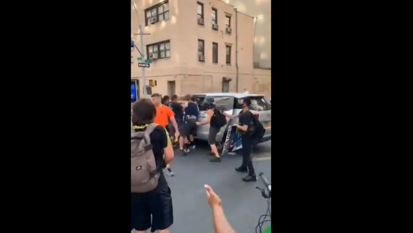 NYC is taking after Portland - a trans femme protestor was pulled into an unmarked van at the Abolition Park protest - this was at 2nd Ave and 25th Street - Sputnik International