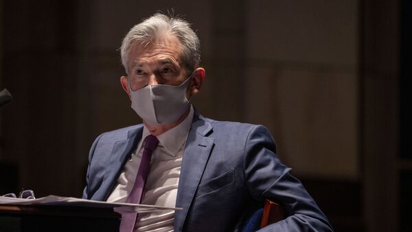 Federal Reserve Chairman Jerome Powell, wearing a face mask, testifies before the House of Representatives Financial Services Committee during a hearing on oversight of the Treasury Department and Federal Reserve response to the outbreak of the coronavirus disease (COVID-19), on Capitol Hill in Washington, U.S., June 30, 2020. - Sputnik International
