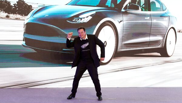 Tesla Inc CEO Elon Musk dances onstage during a delivery event for Tesla China-made Model 3 cars in Shanghai, China January 7, 2020 - Sputnik International