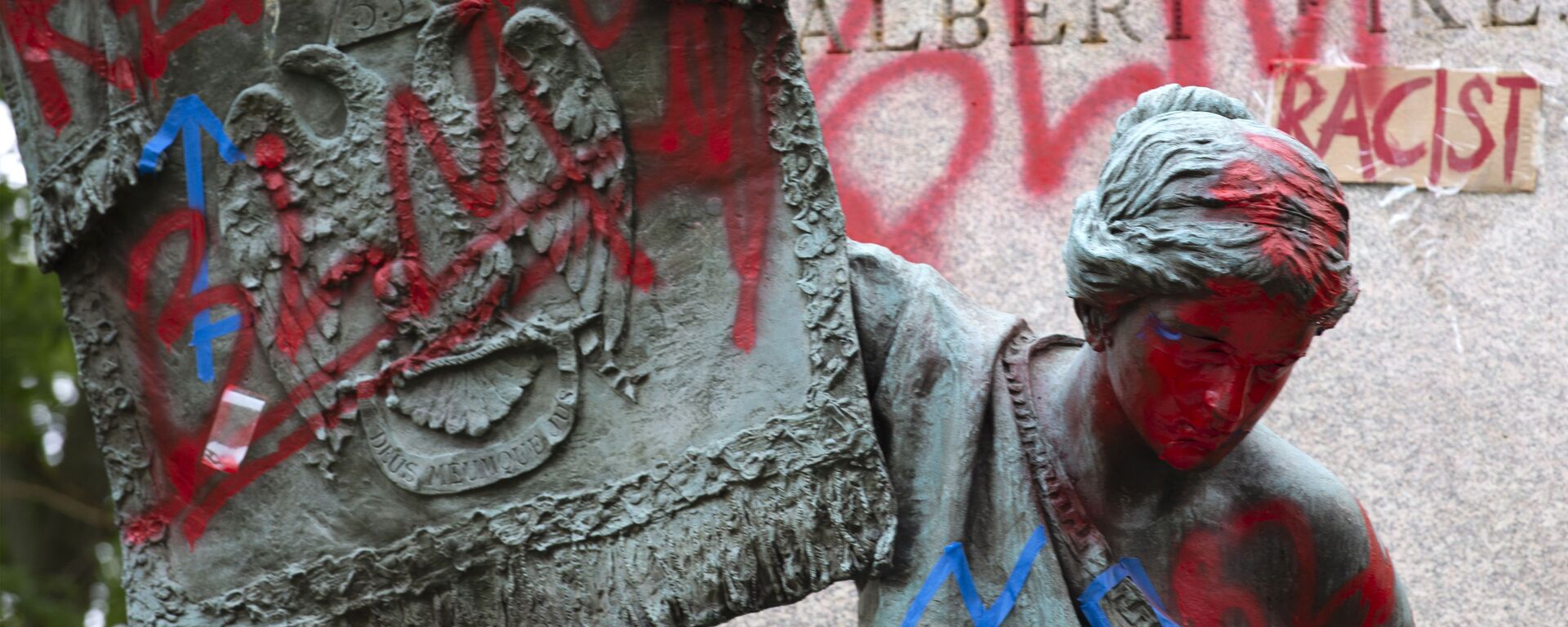 The bronze sculpture representing the Goddess of Masonry on the base of the statue of a Confederate general, Albert Pike, is seen with red paint, after protestors toppled Pike statue's and set on fire early Saturday, June 20, 2020, in Washington. It comes on Juneteenth, the day marking the end of slavery in the United States, amid continuing anti-racism demonstrations following the death of George Floyd in Minneapolis - Sputnik International, 1920, 31.05.2021