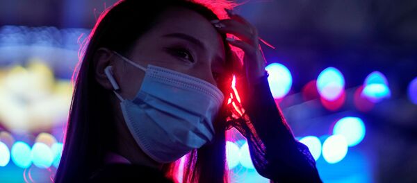 Участница косплея в маске на выставке ChinaJoy в Шанхае Участница косплея в маске на выставке ChinaJoy в Шанхае - Sputnik International