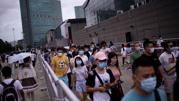 People arrive to attend the China Digital Entertainment Expo and Conference (ChinaJoy) in Shanghai, following the coronavirus disease (COVID-19) outbreak, China July 31, 2020.  - Sputnik International