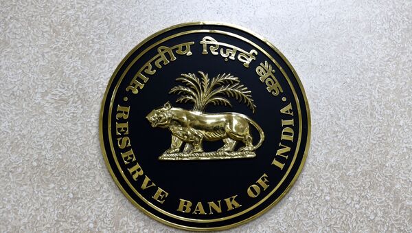 The Reserve Bank of India (RBI) logo is displayed on a wall inside the Reserve Bank of India in New Delhi on July 8, 2019. - Sputnik International