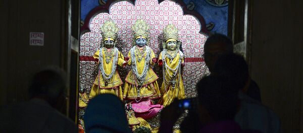 In this picture taken on November 12, 2019, devotees worship inside Ram temple at a Ram Janmabhoomi Nyas workshop in Ayodhya, after the Supreme Court verdict on the disputed religious site In this picture taken on November 12, 2019, devotees worship inside Ram temple at a Ram Janmabhoomi Nyas workshop in Ayodhya, after the Supreme Court verdict on the disputed religious site - Sputnik International