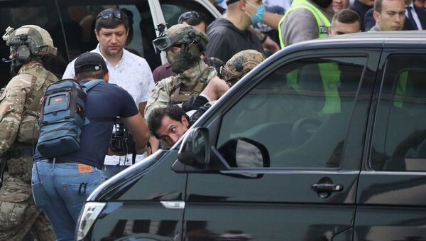 Members of a Ukrainian special forces unit detain a man who threatened to blow up a bomb in a bank branch, in Kyiv, Ukraine August 3, 2020 - Sputnik International