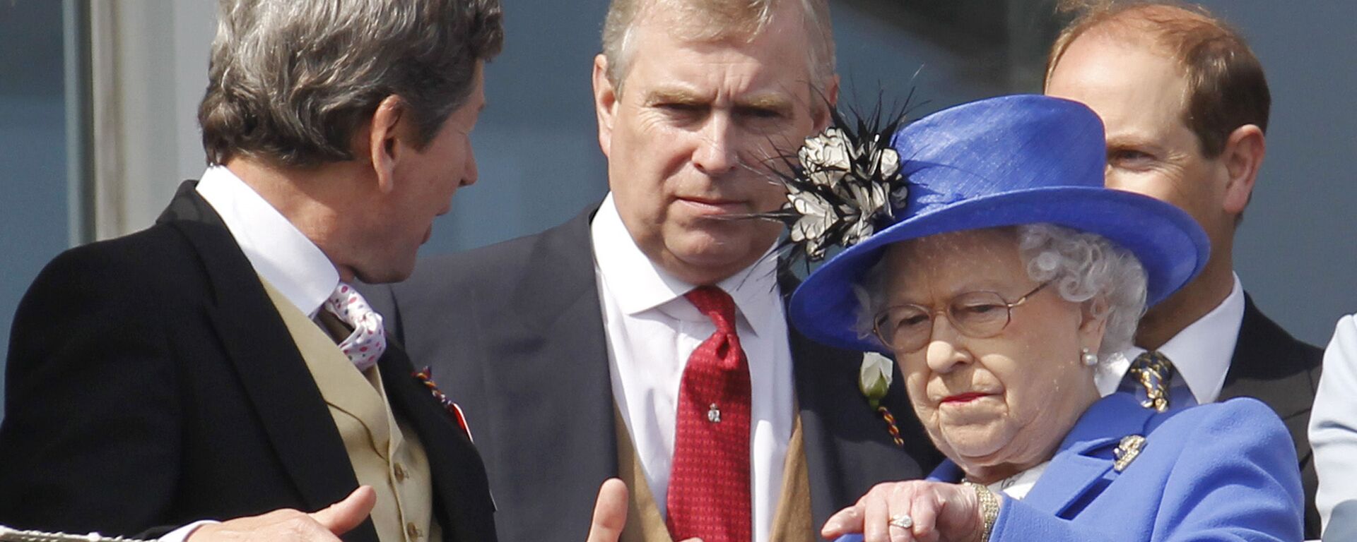 Britain's Queen Elizabeth II, right, talks to her son Prince Andrew, center, as she looks out from the balcony at the end of the Epsom Derby horse race at Epsom racecourse,  England at the start of a four-day Diamond Jubilee celebration to mark the 60th anniversary of  Queen Elizabeth II accession to the throne, Saturday, June 2, 2012 - Sputnik International, 1920, 08.01.2022