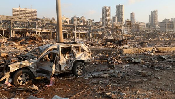 A damaged vehicle is seen at the site of an explosion in Beirut, Lebanon August 4, 2020 - Sputnik International