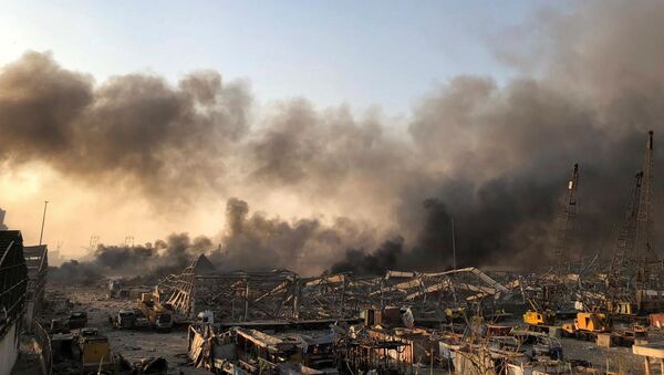 Smoke rises after an explosion was heard in Beirut, Lebanon August 4, 2020 - Sputnik International