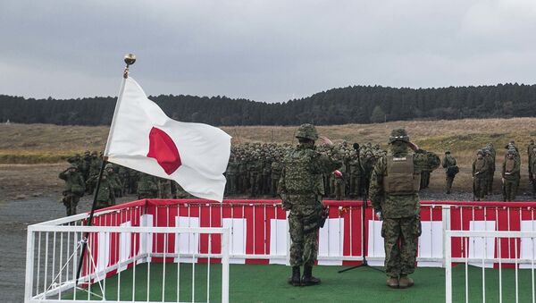 Japan Ground Self-Defense Force Col. Hiroji Yamashita, left, and U.S. Marine Maj. Roy M. Draa salute their troops Dec. 1 during the opening ceremony for Forest Light 15-1 at the Oyanohara Training Area in Yamato, Kumamoto prefecture, Japan. Forest Light is a semi-annual, bilateral exercise consisting of a command post exercise and field training event conducted by elements of III Marine Expeditionary Force and the JGSDF. Yamashita is the commanding officer with 42nd Regiment, 8th Division, Western Army, JGSDF. Draa, from Baltimore, Maryland, and is the executive officer with 2nd Battalion, 9th Marine Regiment, currently attached to 4th Marine Regiment, 3rd Marine Division, III MEF, under the unit deployment program - Sputnik International