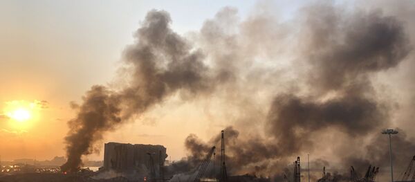 Smoke rises from the site of an explosion in Beirut Smoke rises from the site of an explosion in Beirut - Sputnik International