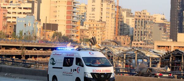 An ambulance drives near the site of Tuesday's blast in Beirut's port area, Lebanon August 5, 2020. REUTERS/Aziz Taher An ambulance drives near the site of Tuesday's blast in Beirut's port area, Lebanon August 5, 2020. REUTERS/Aziz Taher - Sputnik International