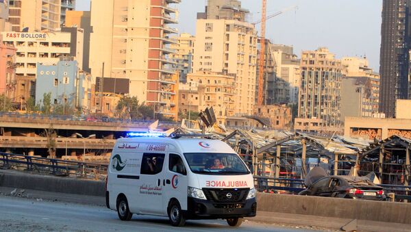 An ambulance drives near the site of Tuesday's blast in Beirut's port area, Lebanon August 5, 2020. REUTERS/Aziz Taher - Sputnik International