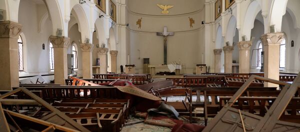 The interior of a church is pictured in the aftermath of yesterday's blast that tore through Lebanon's capital and resulted from the ignition of a huge depot of ammonium nitrate at Beirut's port, on August 5, 2020 - Sputnik International