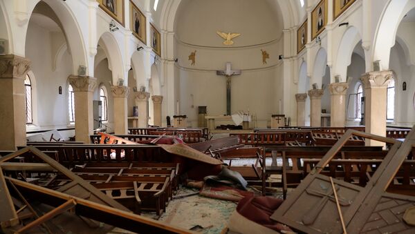 The interior of a church is pictured in the aftermath of yesterday's blast that tore through Lebanon's capital and resulted from the ignition of a huge depot of ammonium nitrate at Beirut's port, on August 5, 2020 - Sputnik International
