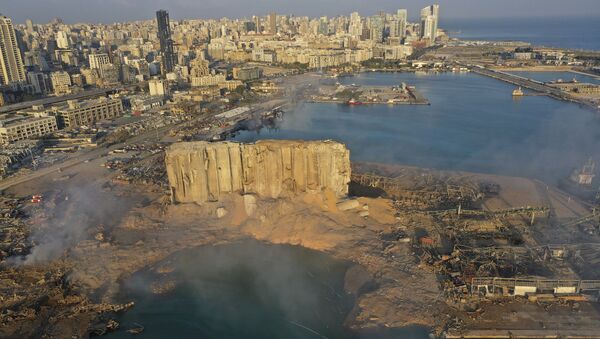 A drone picture shows the scene of an explosion that hit the seaport of Beirut, Lebanon, Wednesday, Aug. 5, 2020. - Sputnik International