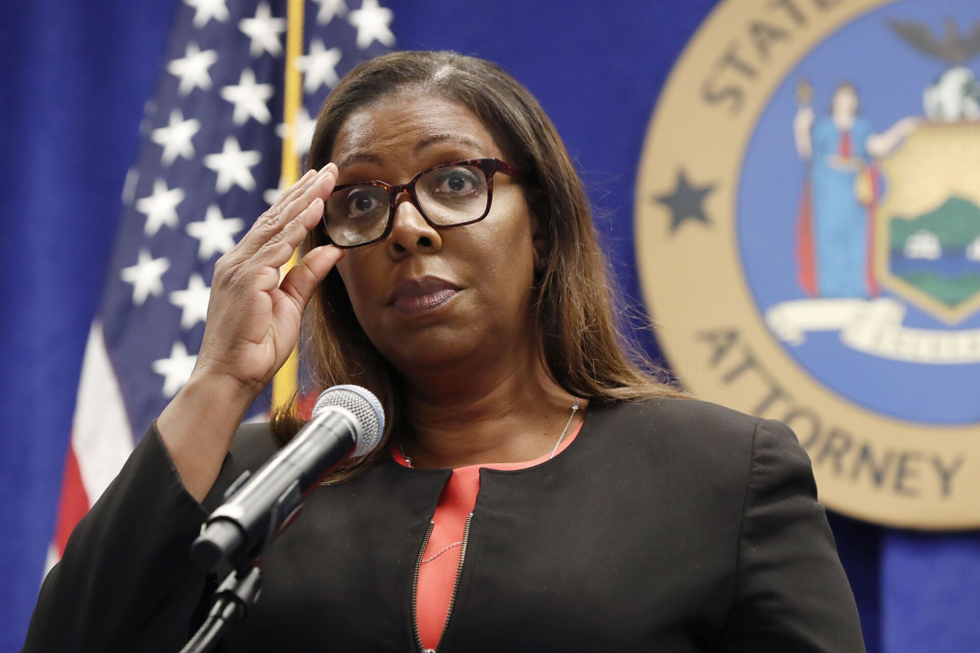 New York State Attorney General Letitia James adjusts her glasses as she announces that the state is suing the National Rifle Association during a press conference, Thursday, Aug. 6, 2020, in New York. James said that the state is seeking to put the powerful gun advocacy organization out of business over allegations that high-ranking executives diverted millions of dollars for lavish personal trips, no-show contracts for associates and other questionable expenditures. (AP Photo/Kathy Willens) - Sputnik International, 1920, 07.09.2021