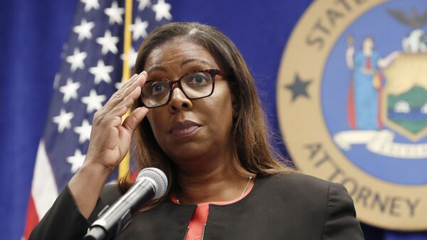 New York State Attorney General Letitia James adjusts her glasses as she announces that the state is suing the National Rifle Association during a press conference, Thursday, Aug. 6, 2020, in New York. James said that the state is seeking to put the powerful gun advocacy organization out of business over allegations that high-ranking executives diverted millions of dollars for lavish personal trips, no-show contracts for associates and other questionable expenditures. (AP Photo/Kathy Willens) - Sputnik International