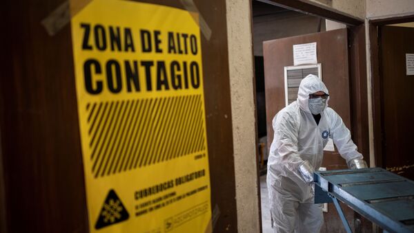 An employee wears protective gear while working at the Azcapotzalco crematorium  in Mexico City, on August 6, 2020, amid the COVID-19 coronavirus pandemic - Sputnik International