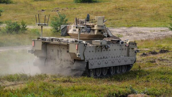 Modified Bradley Fighting Vehicles known as Mission Enabling Technologies Demonstrators (MET-D) and modified M113 tracked armored personnel carriers, known as Robotic Combat Vehicles (RCVs) are being utilized in a soldier operation experimentation at Ft. Carson, Col., from June 15 – Aug. 14, 2020. - Sputnik International