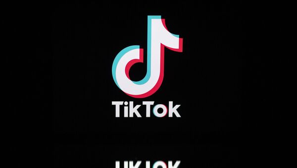 This file photo taken on November 21, 2019, shows the logo of the social media video sharing app Tiktok displayed on a tablet screen in Paris. - Sputnik International