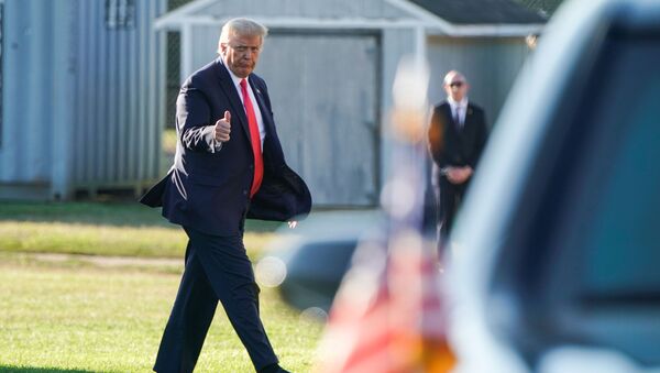 U.S. President Donald Trump walks from Marine One as he arrives in Southampton, New York, U.S., August 8, 2020. - Sputnik International