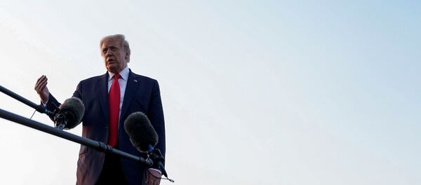 U.S. President Donald Trump speaks to the media before boarding Air Force One as he departs from Bedminster, New Jersey, U.S., August 9, 2020. - Sputnik International
