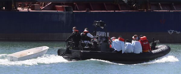 Priti Patel Reportedly in Crossfire With UK Foreign Office Over Leaked 'Unworkable' Asylum Policies  - Sputnik International