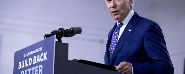 In this July 28, 2020, file photo, Democratic presidential candidate former Vice President Joe Biden speaks at a campaign event at the William Hicks Anderson Community Center in Wilmington, Del. - Sputnik International