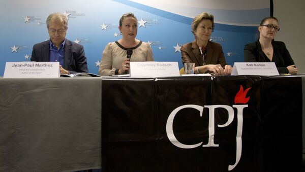 From left, EU correspondent for the Committee to Protect Journalists, Jean-Paul Marthoz, Advocacy Director for the CPJ, Courtney Radsch, Board member and former chairperson for the CPJ, Kati Marton and Central Asia Program Coordinator for the CPJ, Nina Ognianova address a media conference  in Brussels on Tuesday, Sept. 29, 2015. - Sputnik International