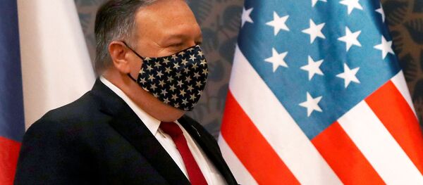 U.S. Secretary of State Mike Pompeo wears a star-spangled mask as he arrives for a joint news conference with the Czech prime minister, at the start of a four-nation tour of Europe, in Prague, Czech Republic August 12, 2020. - Sputnik International