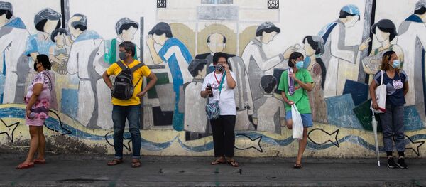 Residents queue for emergency cash assistance from the government, amid the coronavirus disease (COVID-19) outbreak, in Navotas, Metro Manila, Philippines, August 6, 2020 - Sputnik International