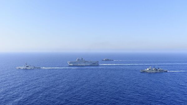 In this photo provided by the Greek National Defence, a French Tonnerre helicopter carrier, center, and French Lafayette frigate, left, are escorted by Greek and French military vessels during a maritime exercise in the Eastern Mediterranean, Thursday, Aug. 13, 2020 - Sputnik International