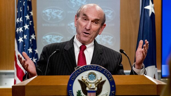 Special Representative for Venezuela Elliott Abrams speaks at a news conference at the State Department on March 31, 2020, in Washington, DC. - The US on Tuesday called on Venezuela's Juan Guaido to renounce his claim to the presidency at least temporarily as it recalibrated its strategy to oust leader Nicolas Maduro.  - Sputnik International