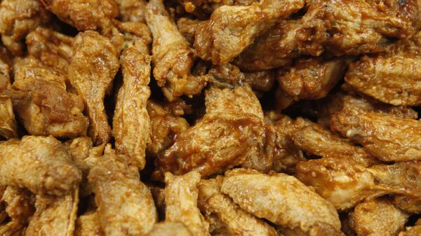 Chicken wings are displayed at the Wing Bowl in Philadelphia, Friday, Feb. 4, 2011. - Sputnik International