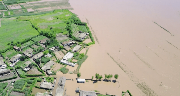 Photos: Rain-Swollen River Swallows Shore Facilities at North Korea’s Primary Nuclear Reactor - Sputnik International
