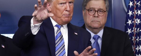 In this March 23, 2020 file photo, President Donald Trump talks during a briefing about the coronavirus in the James Brady Briefing Room, Monday, March 23, 2020, in Washington, as Attorney General William Barr looks on. - Sputnik International