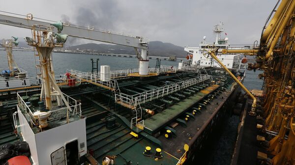 Iranian oil tanker Fortune is anchored at the dock of the El Palito refinery near Puerto Cabello, Venezuela, Monday, May 25, 2020 - Sputnik International