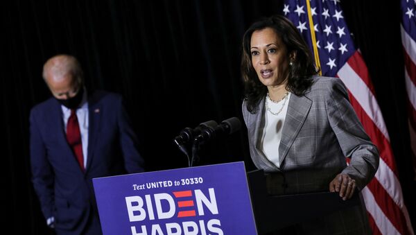 Democratic U.S. vice presidential candidate Kamala Harris speaks to reporters with Democratic U.S. presidential candidate Joe Biden after they received a briefing on the coronavirus disease (COVID-19) pandemic from public health experts during a campaign event in Wilmington, Delaware, U.S., August 13, 2020. - Sputnik International
