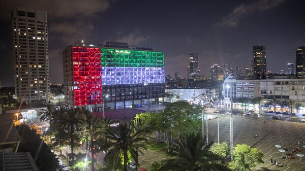 Tel Aviv City Hall is lit up with the flags of the United Arab Emirates and Israel as the countries announced they would be establishing full diplomatic ties, in Tel Aviv, Israel, Thursday, Aug. 13, 2020. In a nationally broadcast statement, Prime Minister Benjamin Netanyahu said the full and official peace with the UAE would lead to cooperation in many spheres between the countries and a wonderful future for citizens of both countries.  - Sputnik International