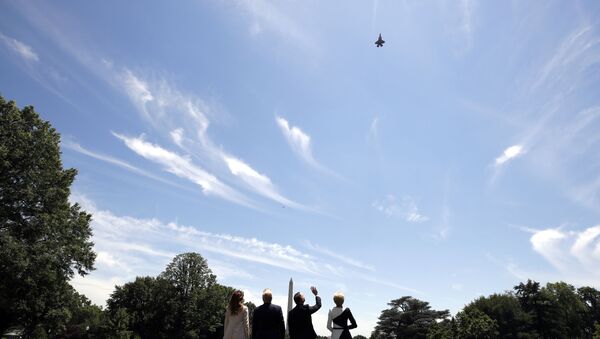 President Donald Trump, first lady Melania Trump, Polish President Andrzej Duda, and his wife Agata Kornhauser-Duda watch a flyover of a F-35 Lightning II jet at the White House, Wednesday, June 12, 2019, in Washington - Sputnik International