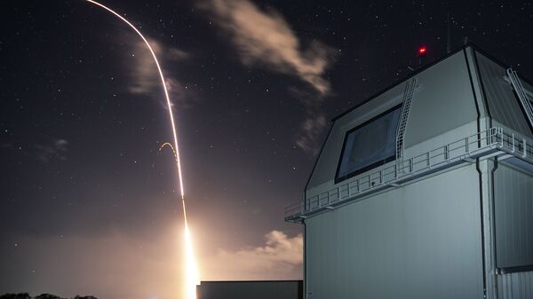 This December 10, 2018, file photo provided by the US Missile Defense Agency (MDA) shows the launch of the military's land-based Aegis missile defense testing system, that later intercepted an intermediate range ballistic missile, from the Pacific Missile Range Facility on the island of Kauai in Hawaii. - Sputnik International