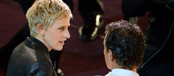 Ellen DeGeneres, left, and Matthew McConaughey are seen in the audience during the Oscars at the Dolby Theatre on Sunday, March 2, 2014, in Los Angeles - Sputnik International
