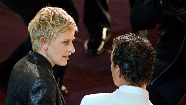Ellen DeGeneres, left, and Matthew McConaughey are seen in the audience during the Oscars at the Dolby Theatre on Sunday, March 2, 2014, in Los Angeles - Sputnik International
