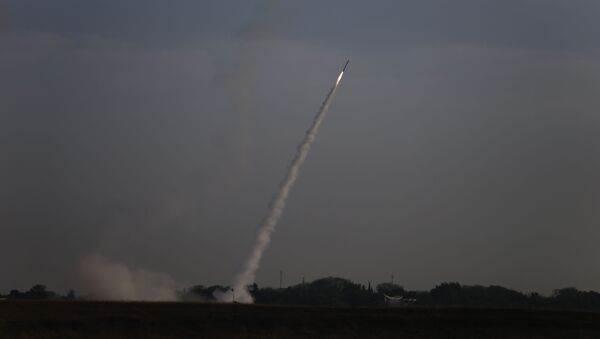 Israeli Iron Dome air defense system launches to intercept rocket fro Gaza Strip, near Israel and Gaza border, Sunday, May 5, 2019. Palestinian militants in the Gaza Strip on Sunday intensified a wave of rocket fire into southern Israel, striking towns and cities across the region while Israeli forces struck dozens of targets throughout Gaza, including militant sites that it said were concealed in homes or residential areas. - Sputnik International